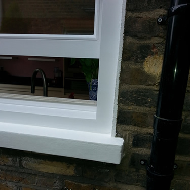 Sash window repaired and painted